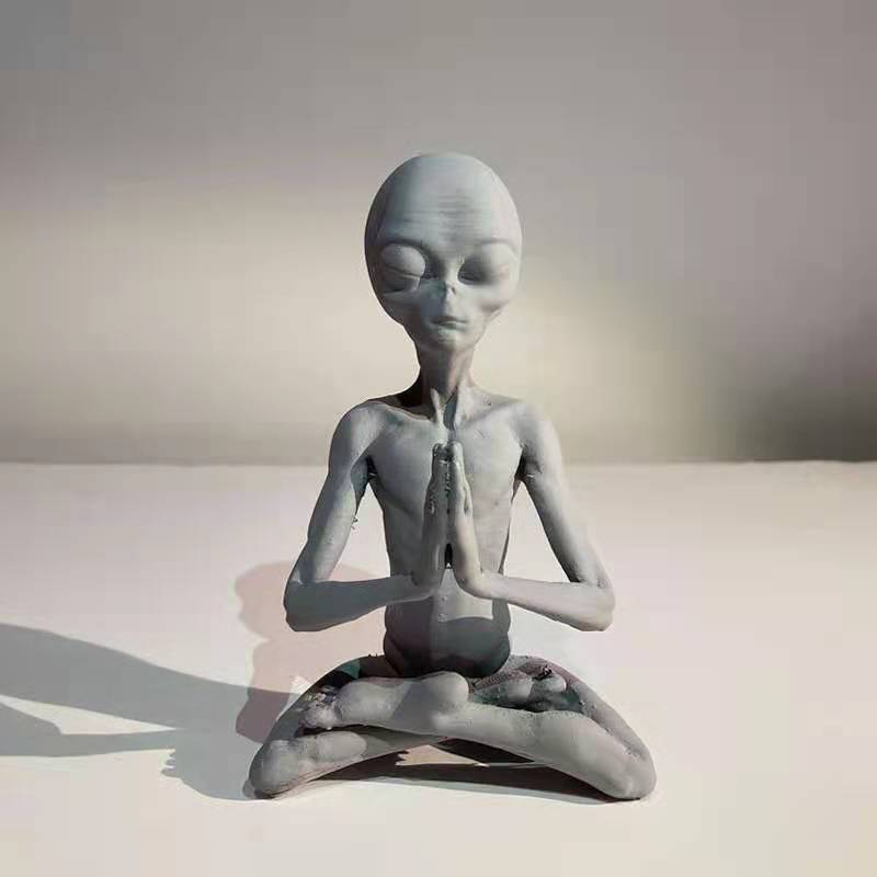 Meditating Alien Statue