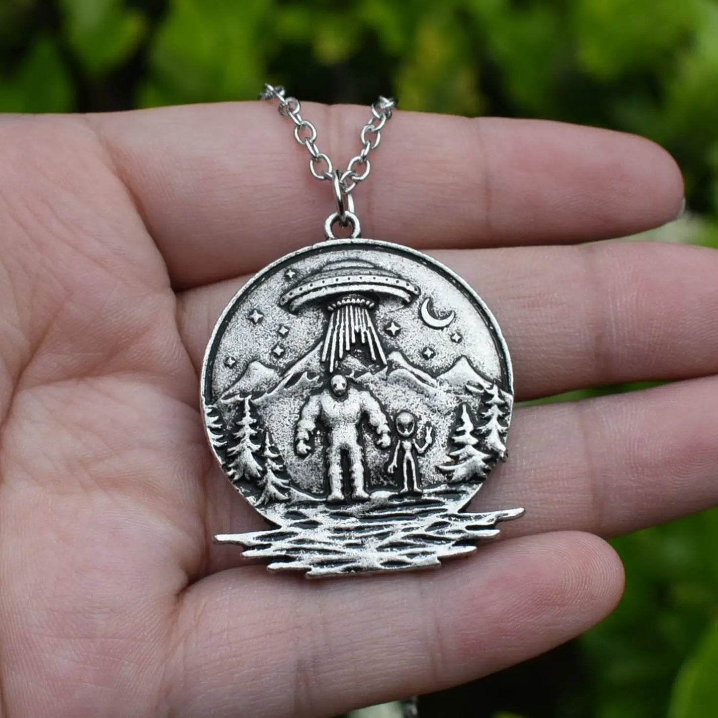 Cosmic Bond: Bigfoot & Alien Necklace